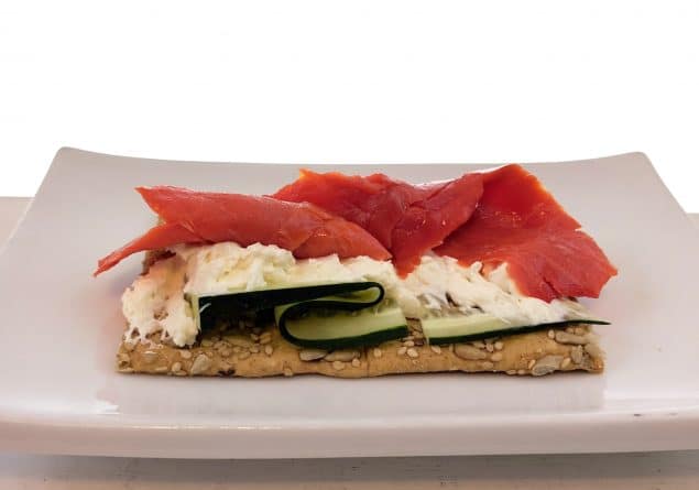 cured salmon with cream cheese and cucumber on bread