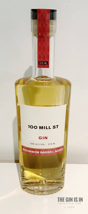 100 Mill St Bourbon Barrel Aged Gin Bottle