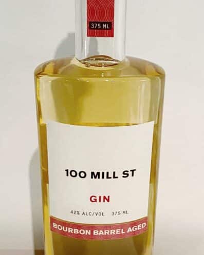 100 Mill St Bourbon Barrel Aged Gin Bottle